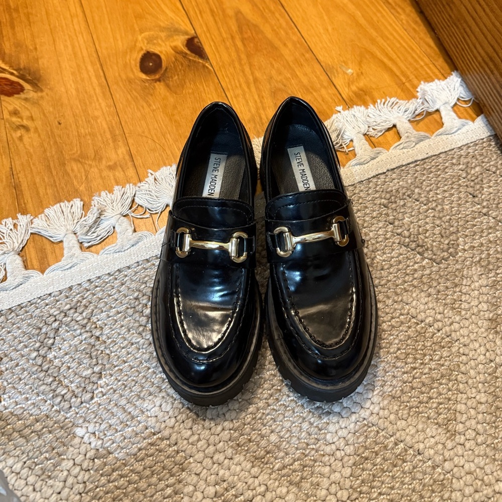 Steve Madden Shiny Black Loafers with Gold Buckles